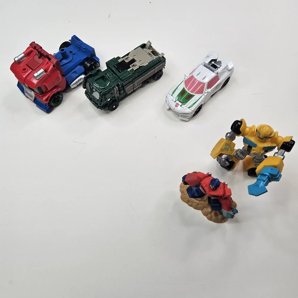 Lot of 5 Transformers Action Figures - Optimus Prime, Bumblebee & More